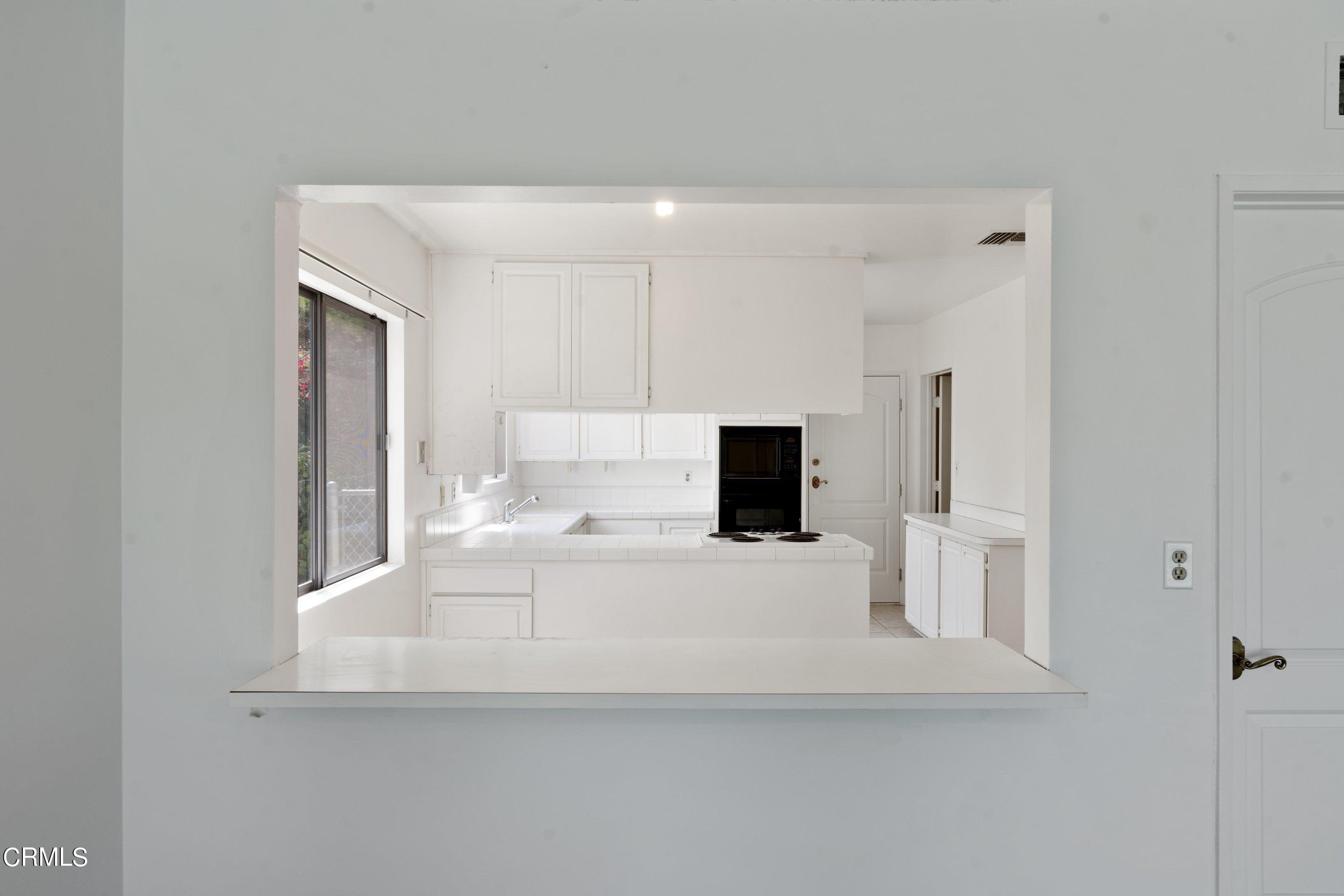 3347 Wrightwood Drive Studio City, CA 91604 - Photo 25 of 44 a large white bed in a white room