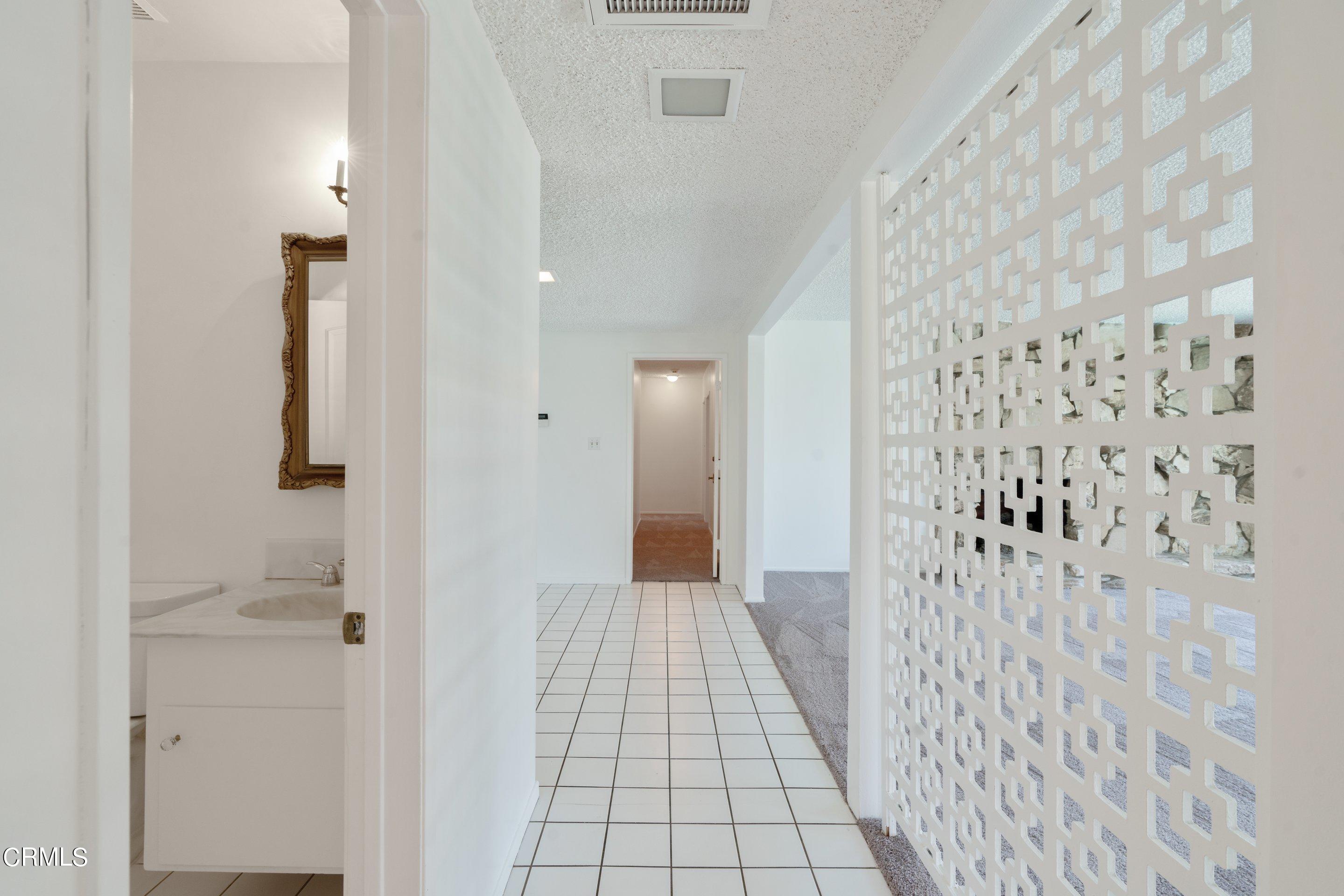 3347 Wrightwood Drive Studio City, CA 91604 - Photo 32 of 44 a view of a bathroom with a shower