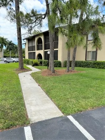 a view of a house with a swimming pool