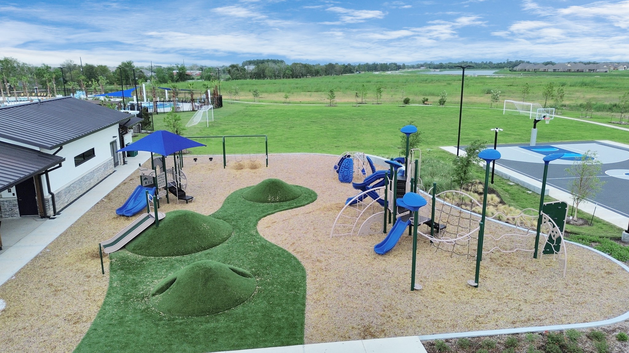 10304 Malta Trace Drive Rosharon, TX 77583 - Photo 36 of 49 For relaxation and recreation residents can enjoy the Resort Style Amenity Village offering:Heated Lazy River,Resort Style Pool,Splash Pad,Playground,Multiple Sports Courts-Basketball,Pickleball,Bocce Ball,Tennis,Sports Field,Sand Beach,Cabana & Hammock area, Clubhouse with Fitness Center,Lounge,Great Room & Outdoor Pavillon.