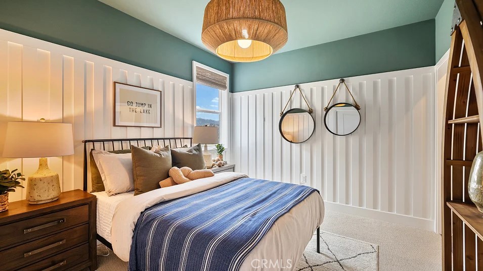 27463 Sand Almond Way Newhall, CA 91381 - Photo 13 of 26 a bedroom with a bed and a painting on the wall