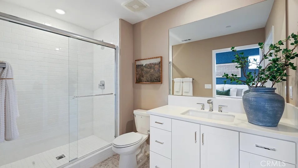 27463 Sand Almond Way Newhall, CA 91381 - Photo 19 of 26 a bathroom with a sink a toilet and shower