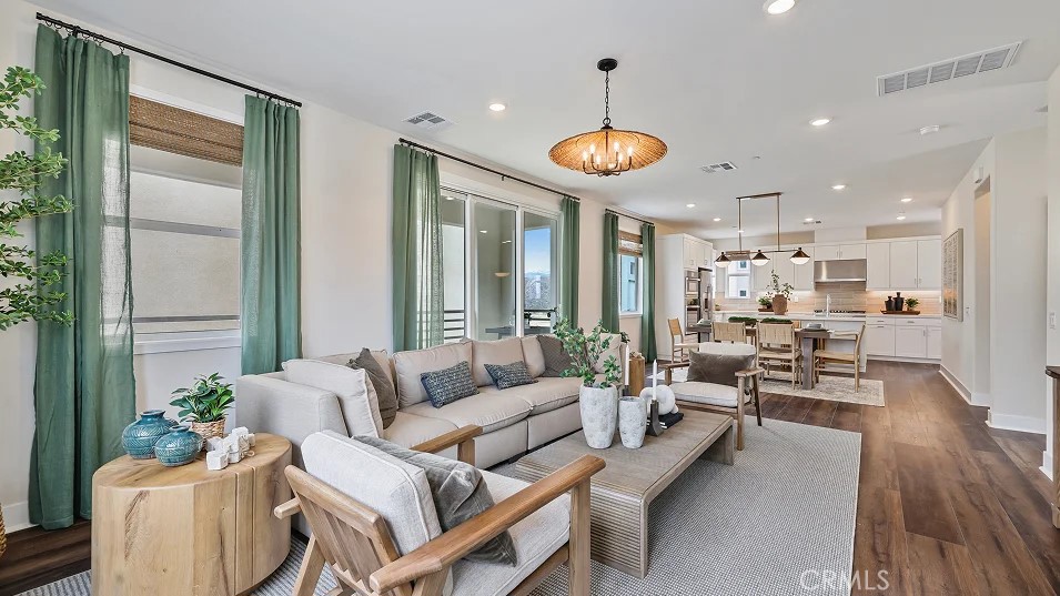 27463 Sand Almond Way Newhall, CA 91381 - Photo 6 of 26 a living room with furniture kitchen and a large window