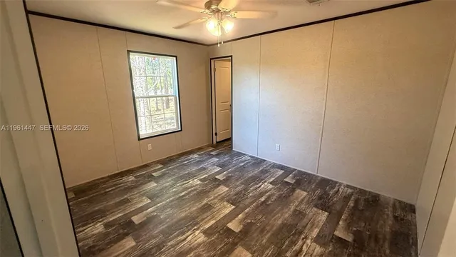 a kitchen with a stove a sink and a refrigerator