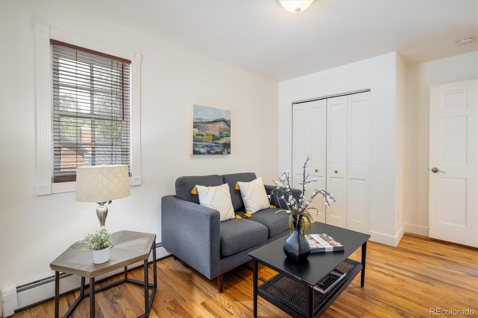 855 Main Street Boulder, CO 80302 - Photo 13 of 41 a living room with furniture and wooden floor