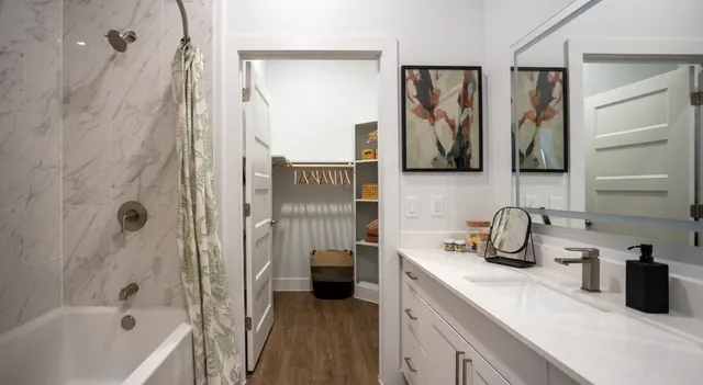 a kitchen with a refrigerator and a sink