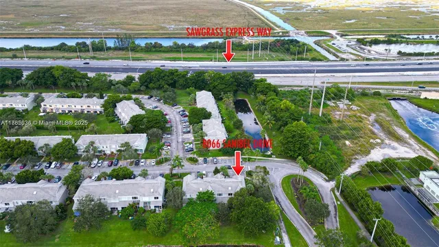 a view of swimming pool with outdoor space and seating area