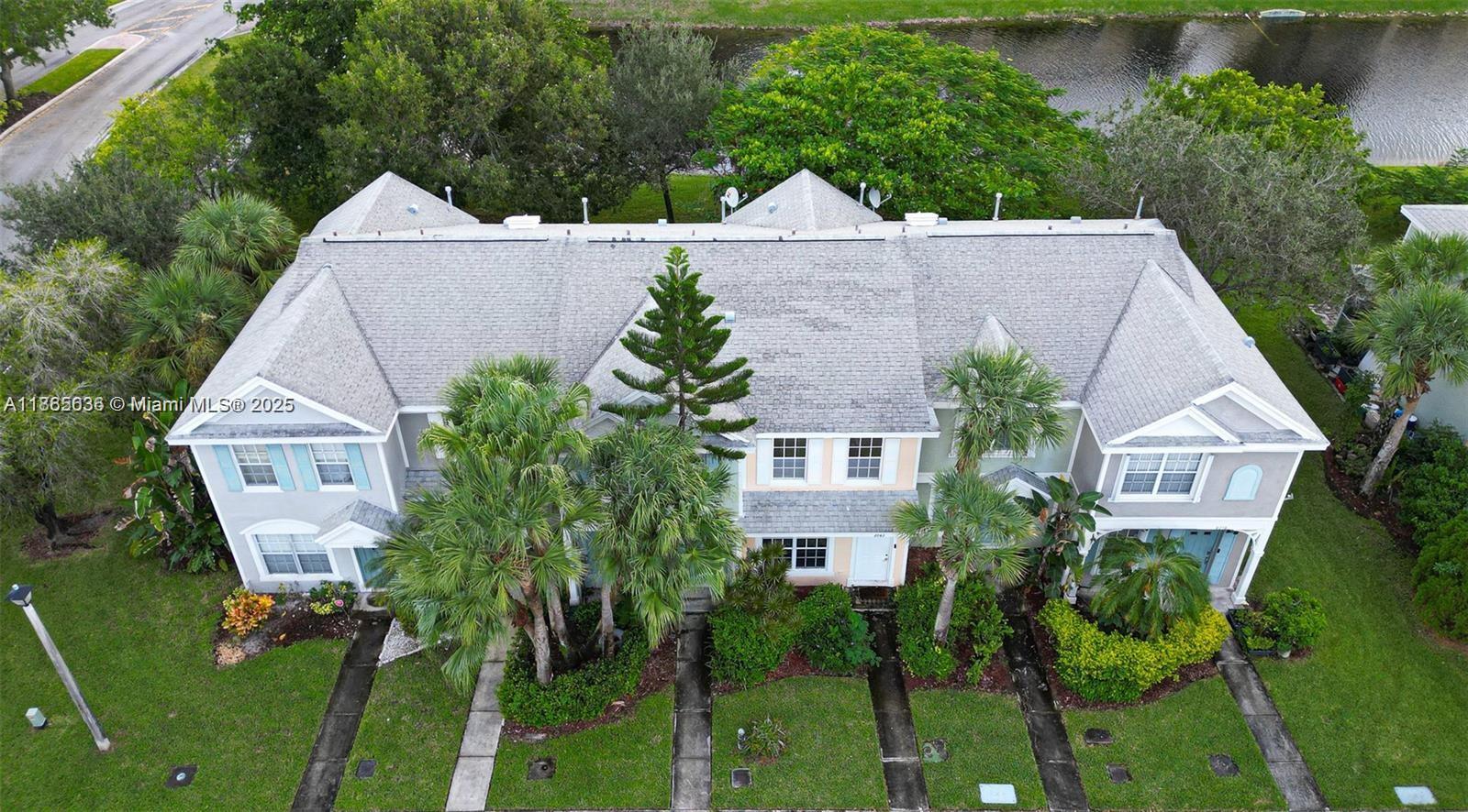 8066 Sanibel Drive, Unit 8066 Tamarac, FL 33321 - Photo 16 of 23 an aerial view of a house