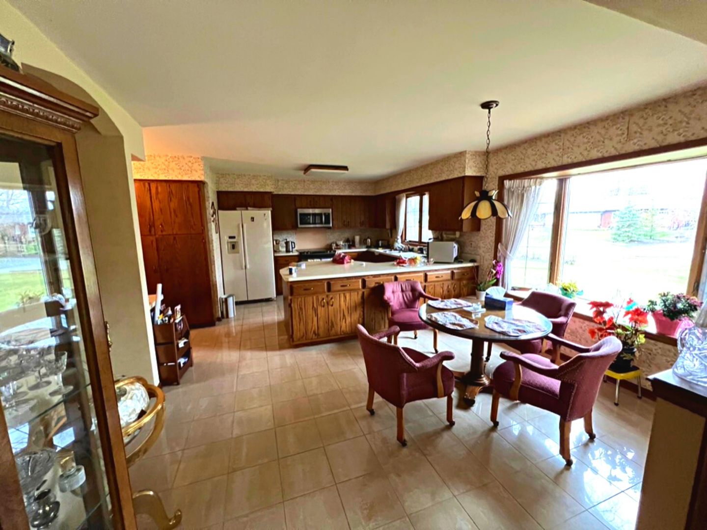 910 North Prospect Avenue Park Ridge, IL 60068 - Photo 6 of 18 a view of a dining room with furniture window and outside view