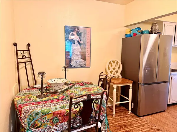 a bedroom with a bed and a table in it