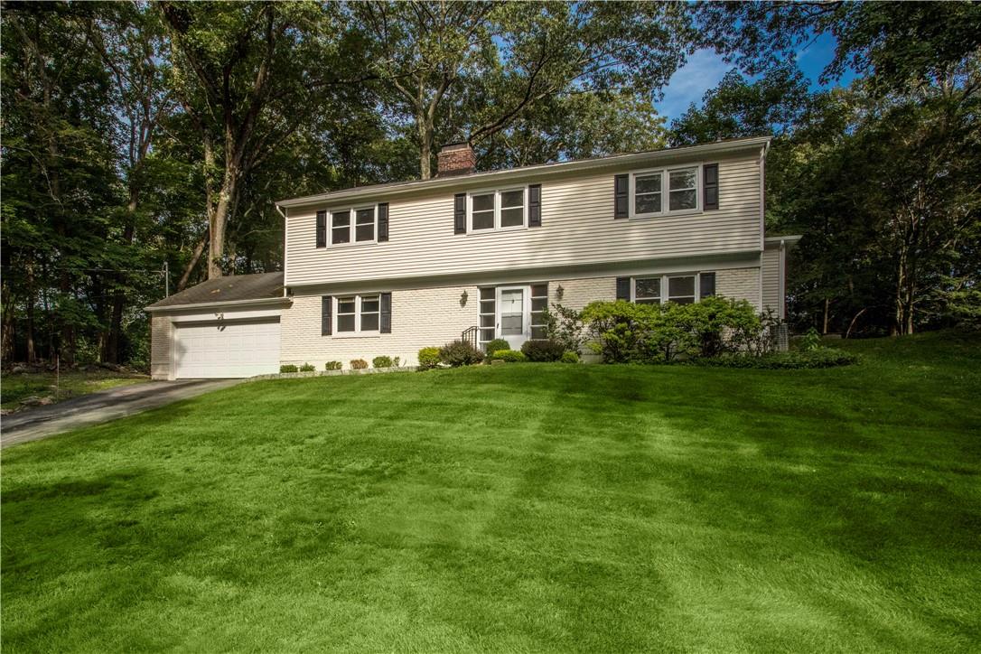 Set up hgh on 1.46 acres, this split-colonial home offers 4 Bedrooms, 2 1/2 updated baths and an office, 2 Fireplaces, and multiple accesses to the private yard.