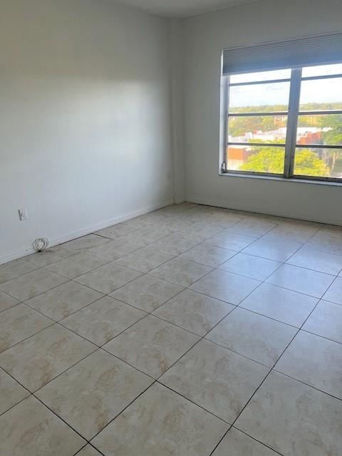 4164 Inverrary Drive, Unit 803 Lauderhill, FL 33319 - Photo 4 of 16 a view of an empty room with a window