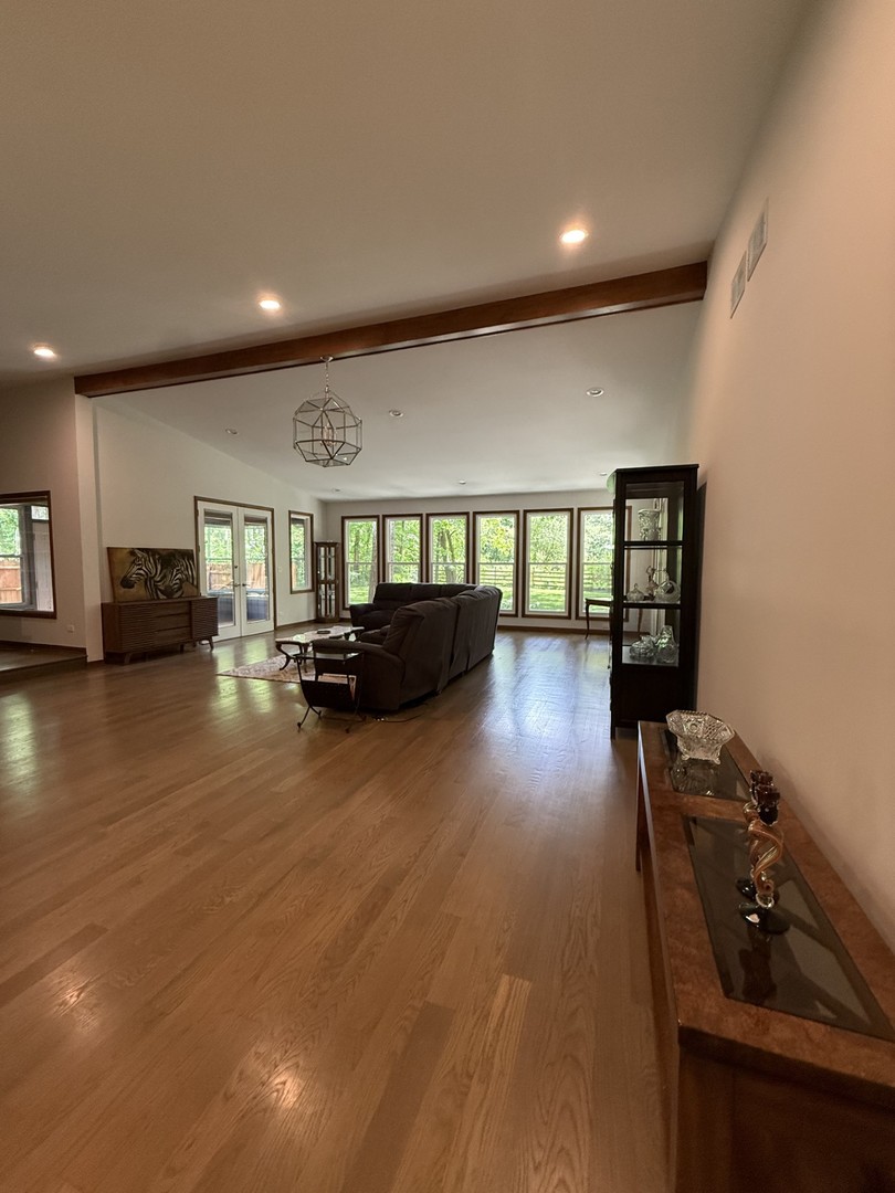 2841 Orange Brace Road Deerfield, IL 60015 - Photo 2 of 30 a living room with furniture and a wooden floor