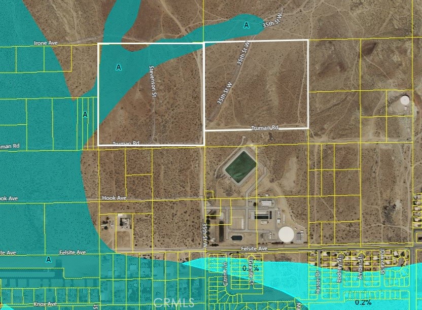 35 35th Street Rosamond, CA 93560 - Photo 9 of 14 a bathroom with a sink and a shower