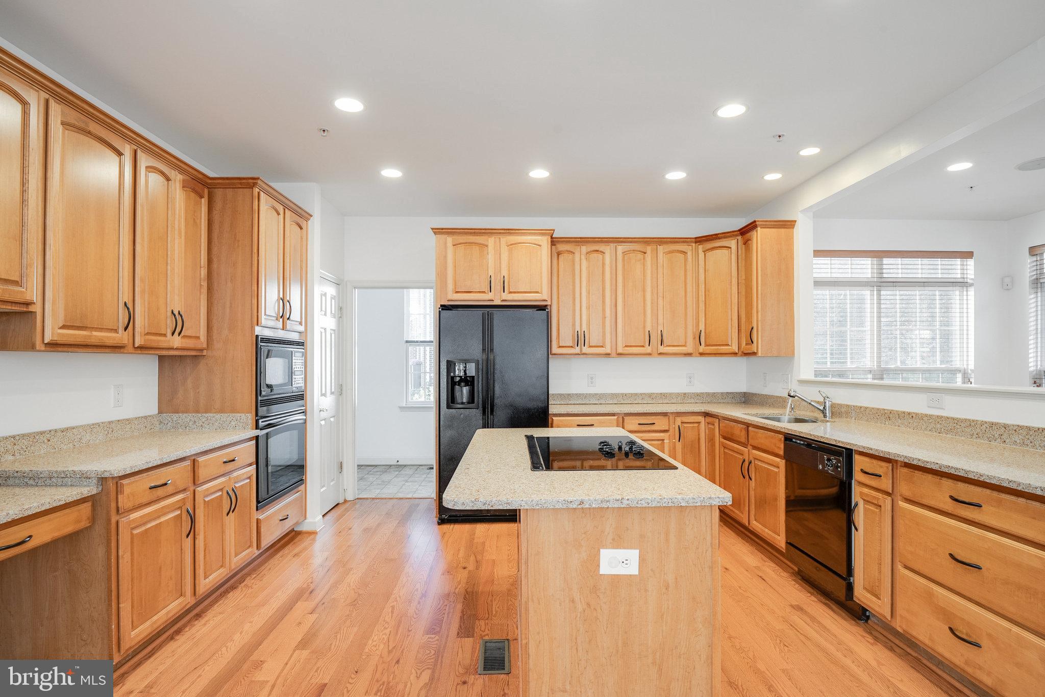 9117 Sumner Grove Drive Laurel, MD 20708 - Photo 18 of 43 Open Kitchen with Mud Room and Morning Room