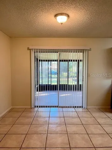 a view of a room with a large window