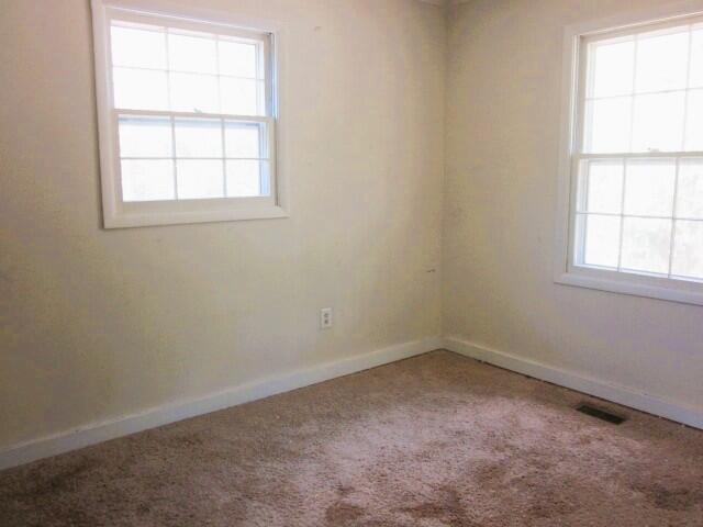 5574 Providence Church Road Ferrum, VA 24088 - Photo 12 of 17 an empty room with a window