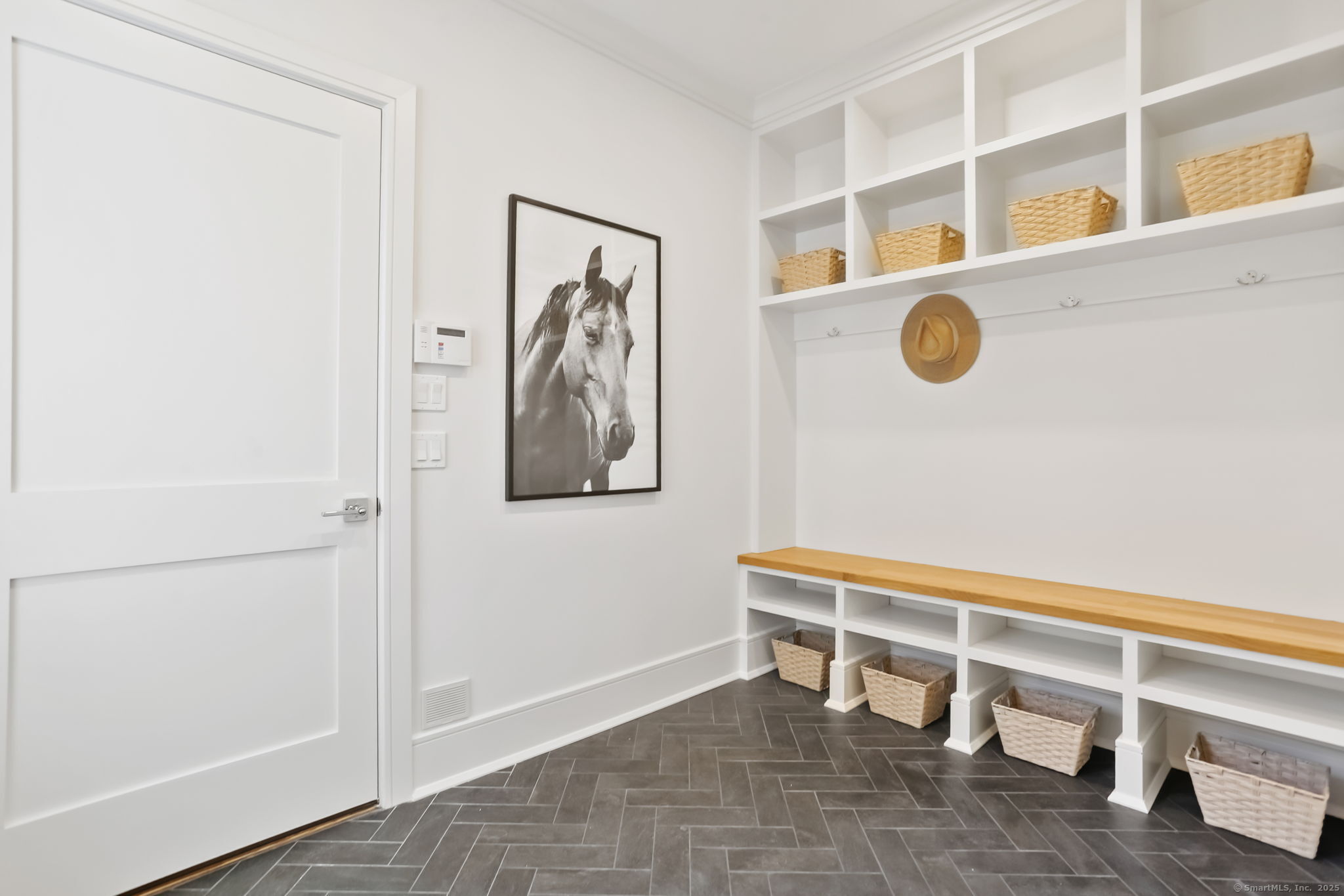 45 Robin Circle Fairfield, CT 06824 - Photo 18 of 40 a view of a door and chair in a room