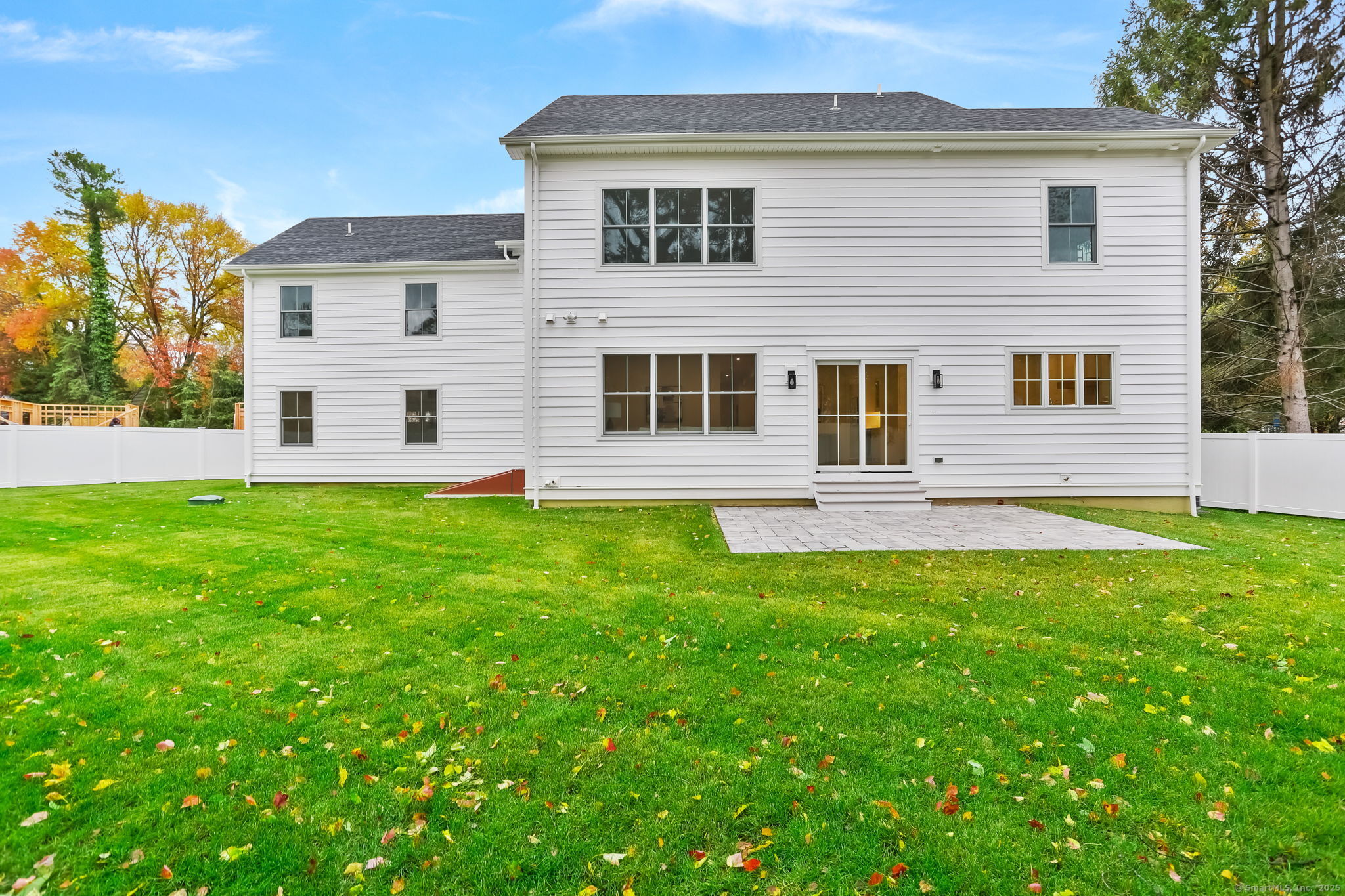45 Robin Circle Fairfield, CT 06824 - Photo 37 of 40 a view of a house with a backyard