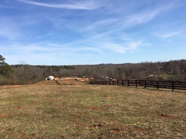 Beautiful level spot towards back of property is perfect spot for building a home. Gorgeous views.