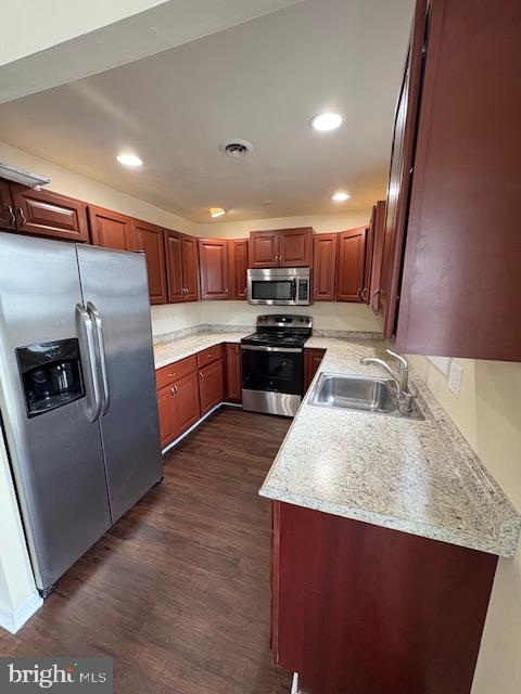 175 Valley Circle Newark, DE 19711 - Photo 2 of 17 a kitchen with stainless steel appliances granite countertop a sink a stove top oven a refrigerator and dishwasher