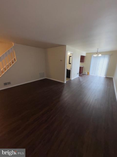 175 Valley Circle Newark, DE 19711 - Photo 8 of 17 a view of empty room with wooden floor