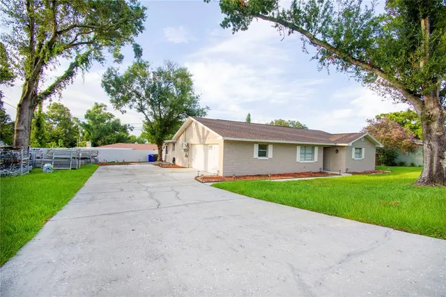 a front view of a house with yard