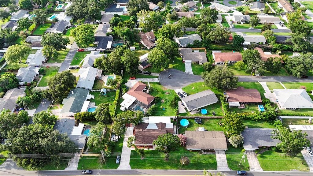 1504 Hallam Drive Lakeland, FL 33813 - Photo 34 of 34 an aerial view of residential houses with outdoor space and street view