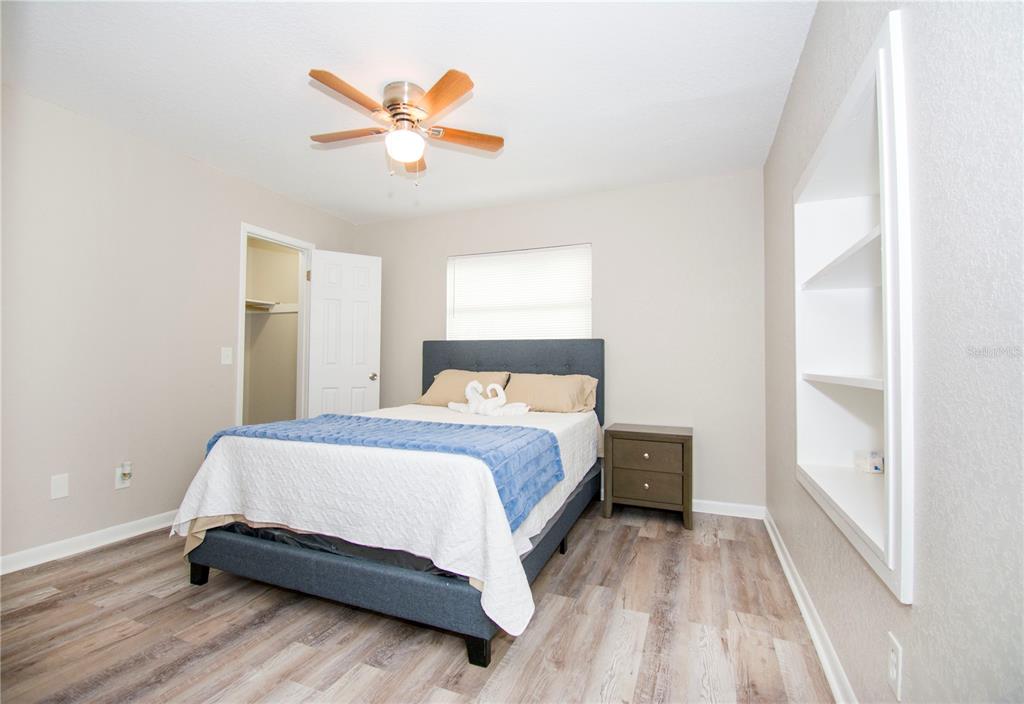 1504 Hallam Drive Lakeland, FL 33813 - Photo 10 of 34 a bedroom with a bed and window