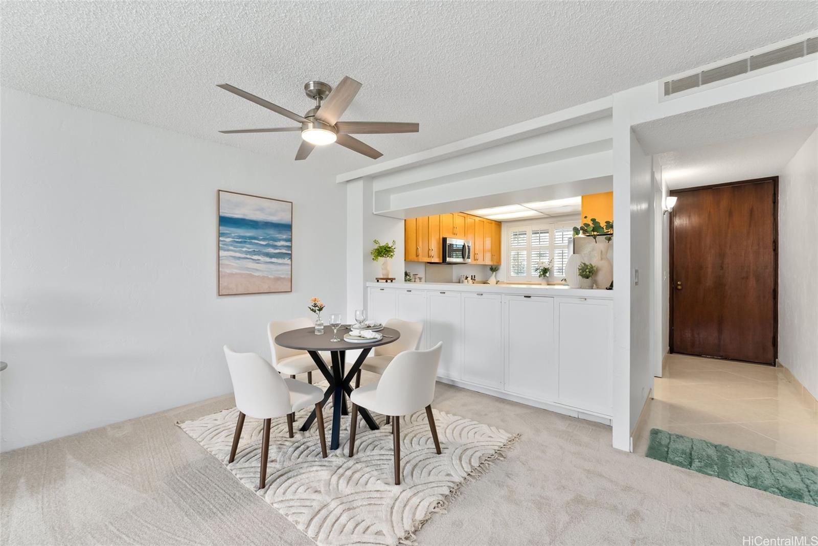 500 Lunalilo Home Road, Unit 25B Honolulu, HI 96825 - Photo 8 of 23 a view of a dining room with furniture and a window