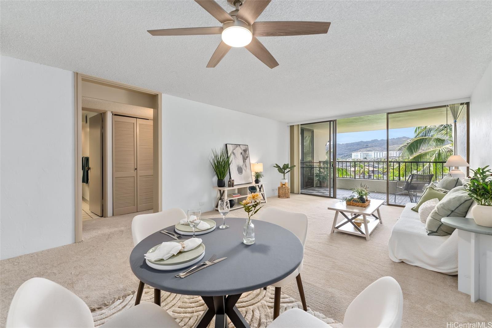 500 Lunalilo Home Road, Unit 25B Honolulu, HI 96825 - Photo 9 of 23 a living room with furniture and a large window