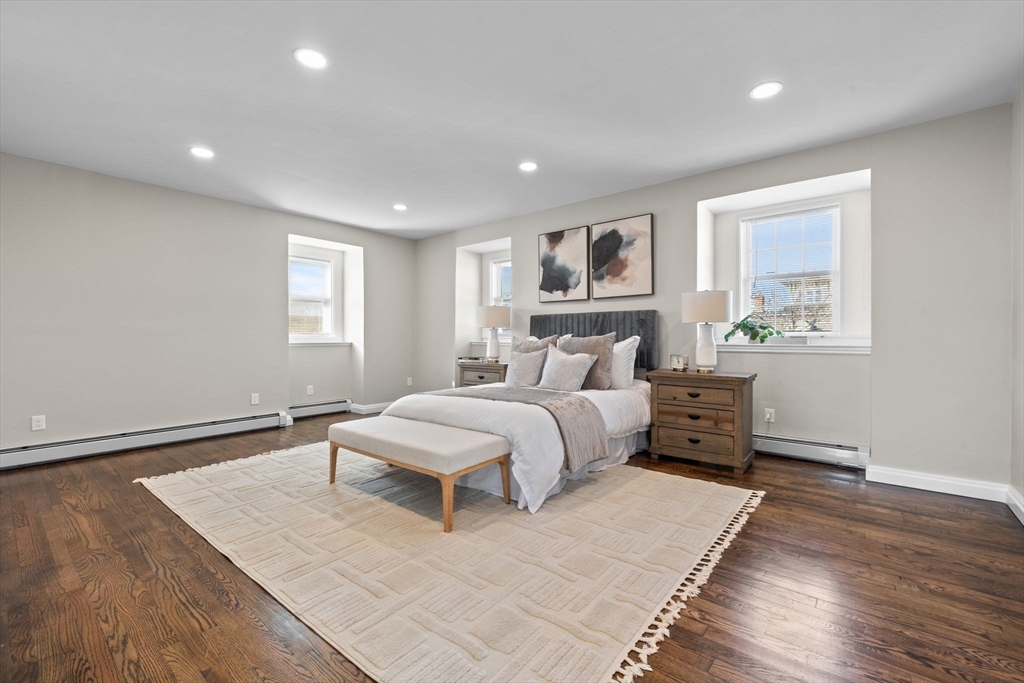 62 Chestnut Street, Unit 2 Saugus, MA 01906 - Photo 13 of 22 a bedroom with a bed and a window