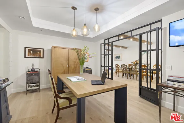 a bathroom with a tub shower and toilet