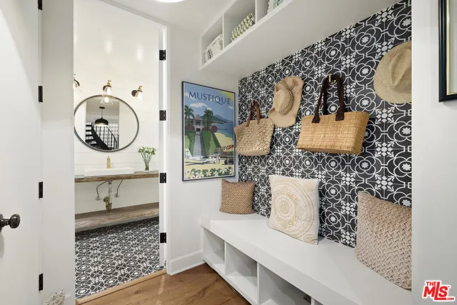 a spacious bedroom with a bed and a desk