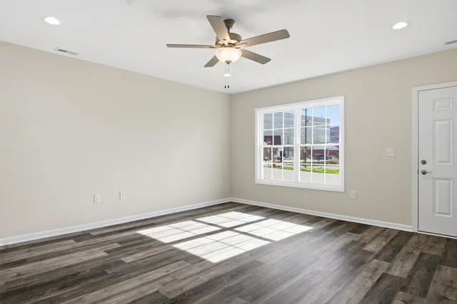 a view of kitchen with wooden floor