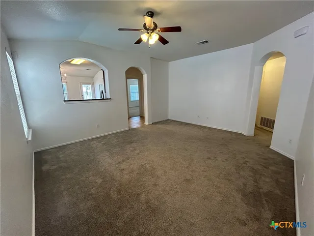 a view of a hallway with entryway