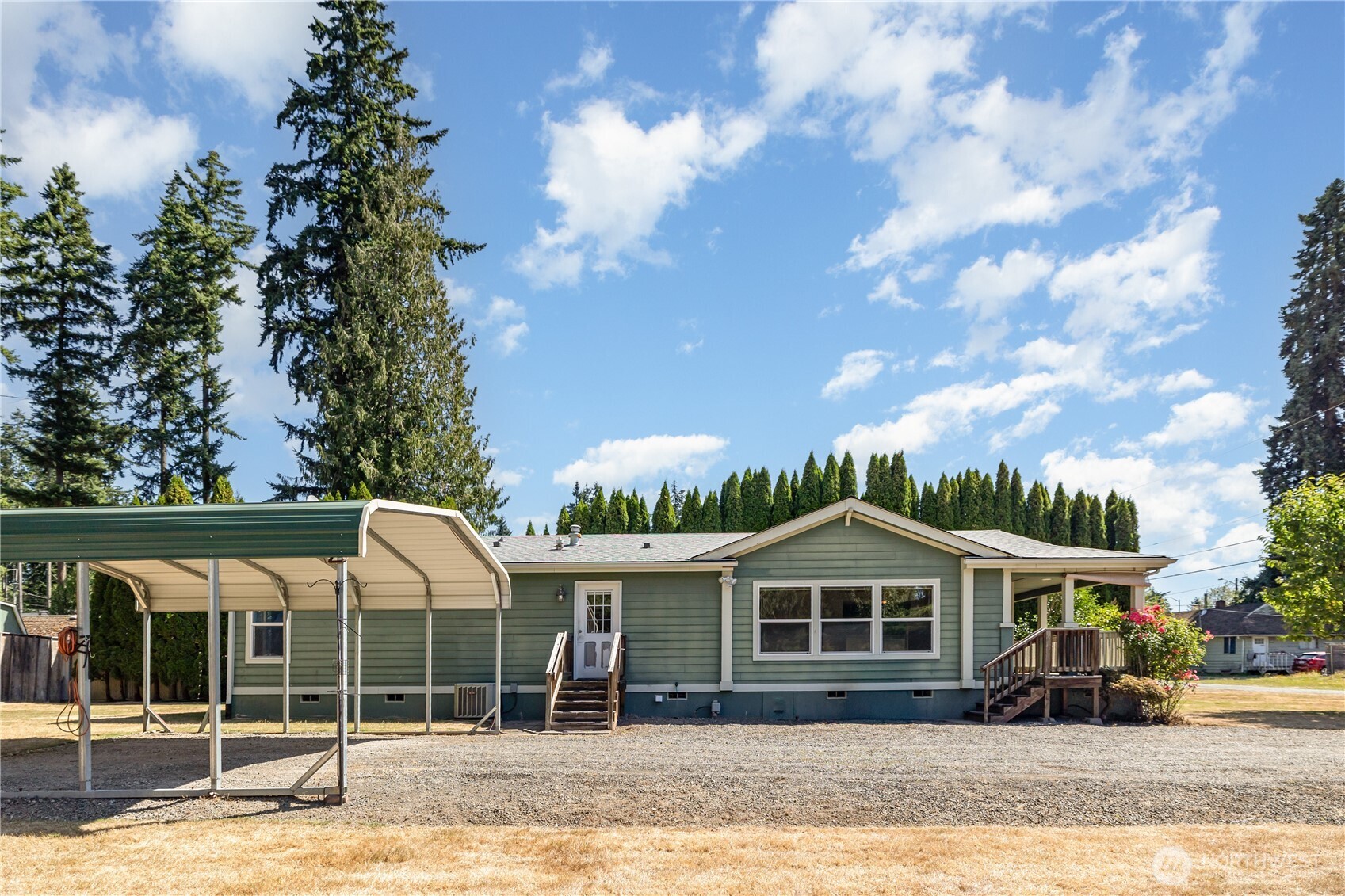 217 172nd Place Southwest Bothell, WA 98012 - Photo 2 of 31 a front view of a house with a garden