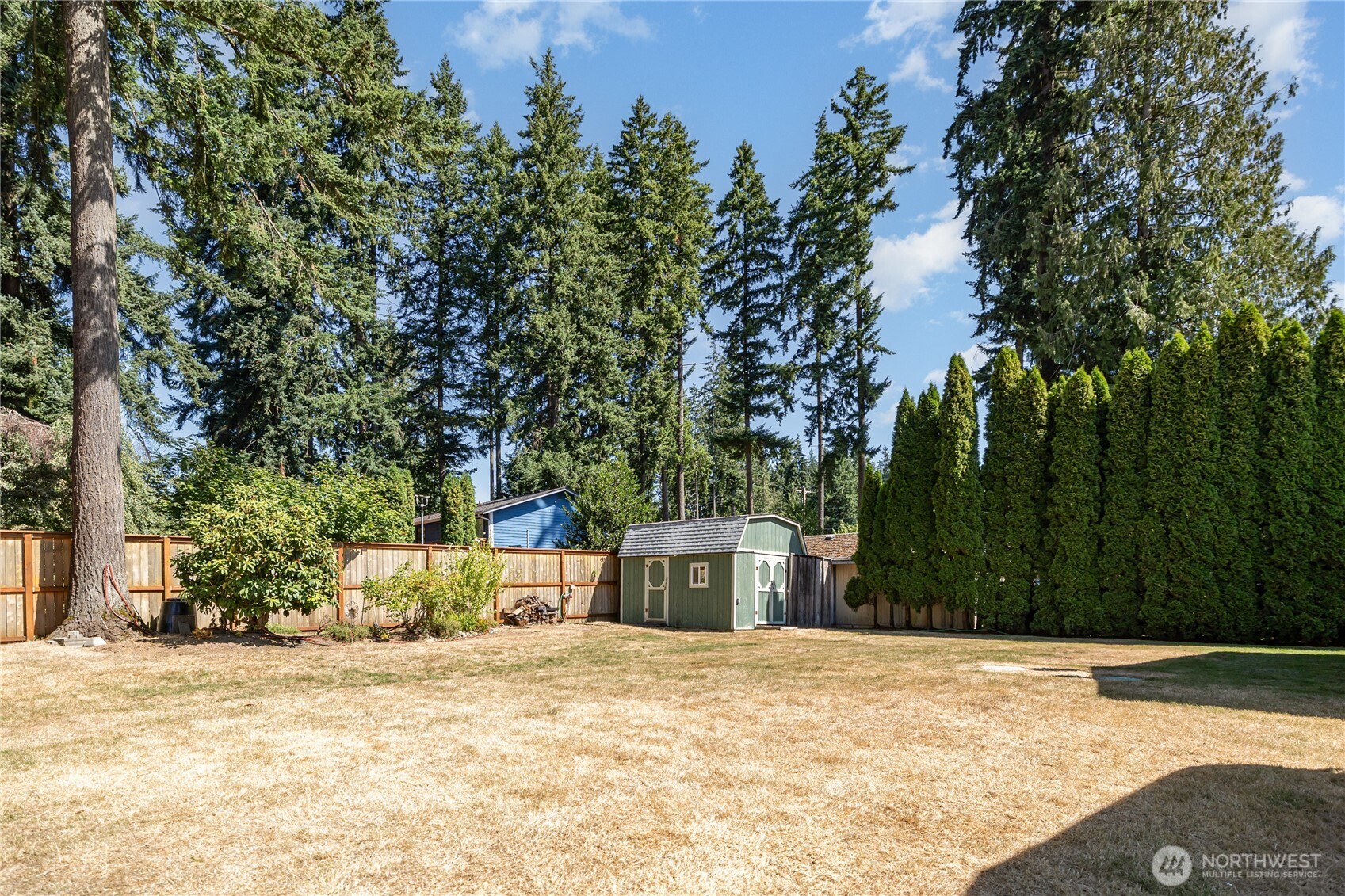 217 172nd Place Southwest Bothell, WA 98012 - Photo 27 of 31 a house with trees in the background