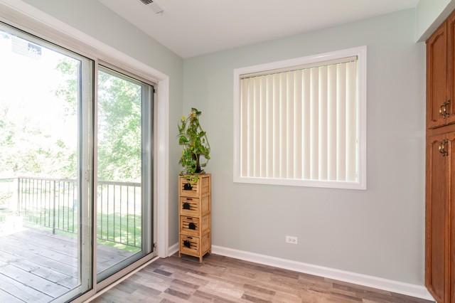 237 Memory Lane, Unit 83 Westmont, IL 60559 - Photo 7 of 16 a view of an empty room with windows