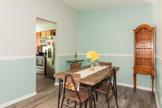 237 Memory Lane, Unit 83 Westmont, IL 60559 - Photo 8 of 16 a view of a dining room with furniture and wooden floor