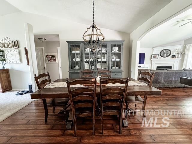 808 O'Leary Way Twin Falls, ID 83301 - Photo 9 of 37 Vaulted ceiling dining area featuring wood-finish flooring
