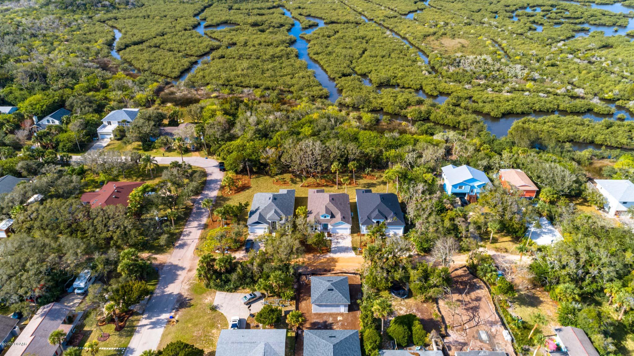 1851 Oak Place Flagler Beach, FL 32136 - Photo 11 of 31 an aerial view of residential houses with outdoor space