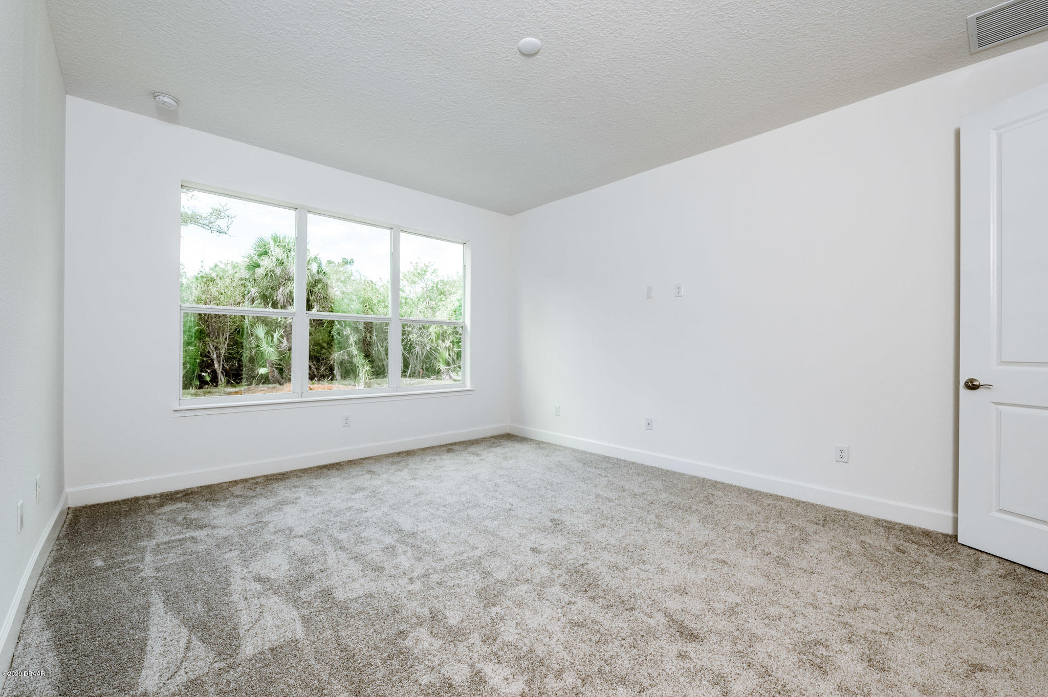 1851 Oak Place Flagler Beach, FL 32136 - Photo 29 of 31 an empty room with large window