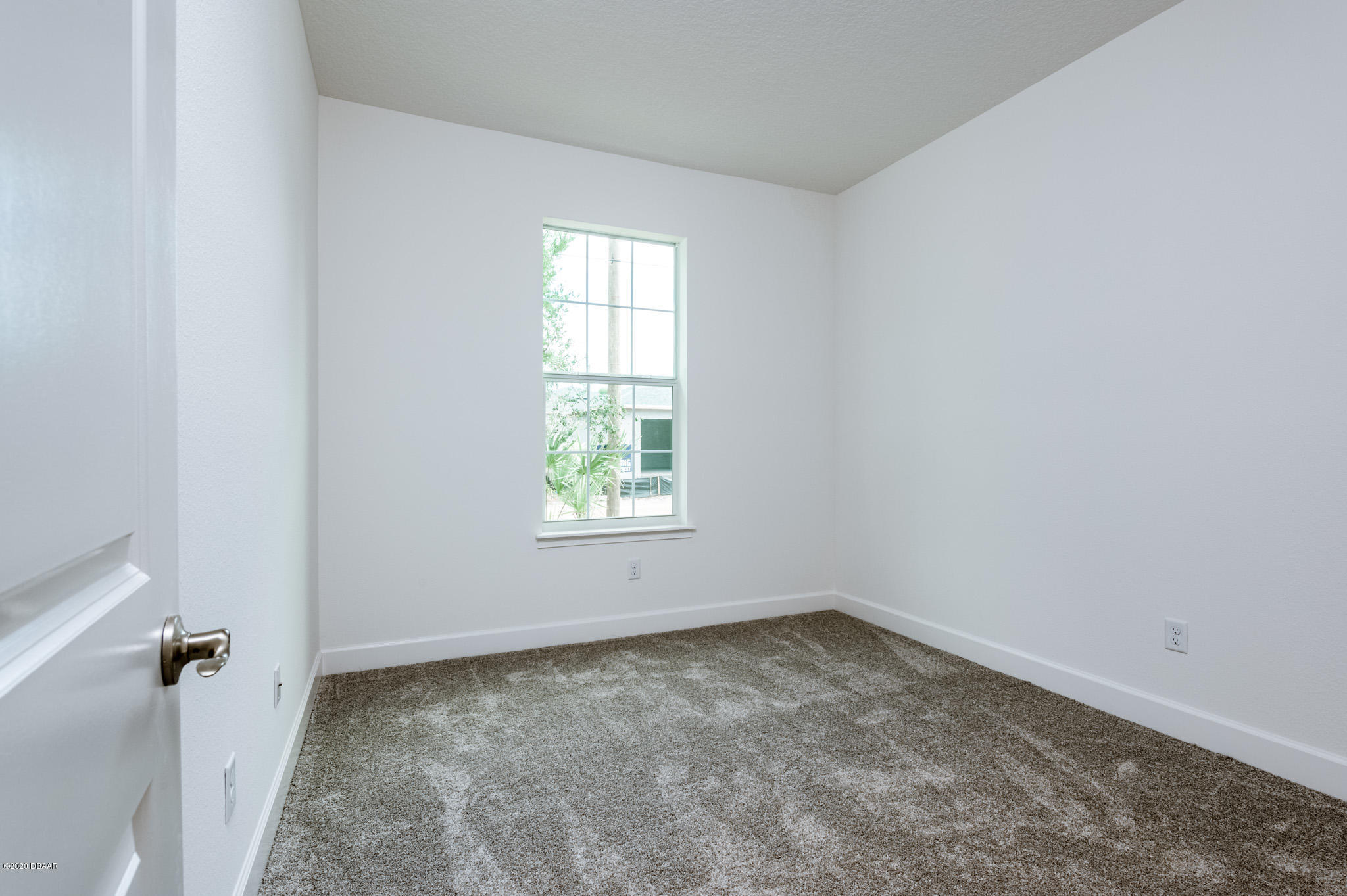 1851 Oak Place Flagler Beach, FL 32136 - Photo 30 of 31 an empty room with a window