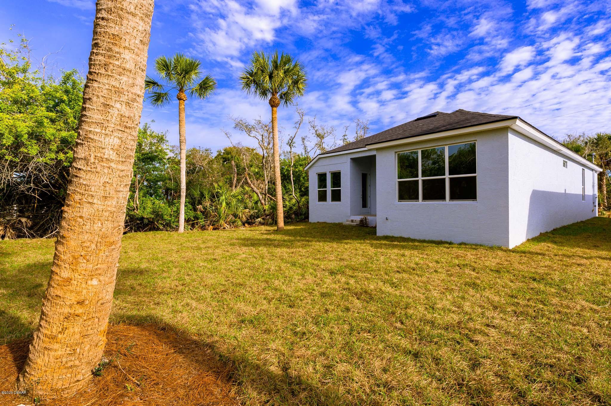 1851 Oak Place Flagler Beach, FL 32136 - Photo 3 of 31 a view of a backyard