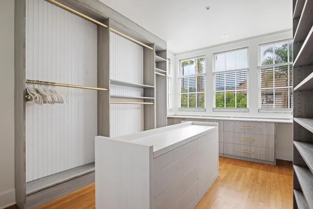 a kitchen with a refrigerator and a sink