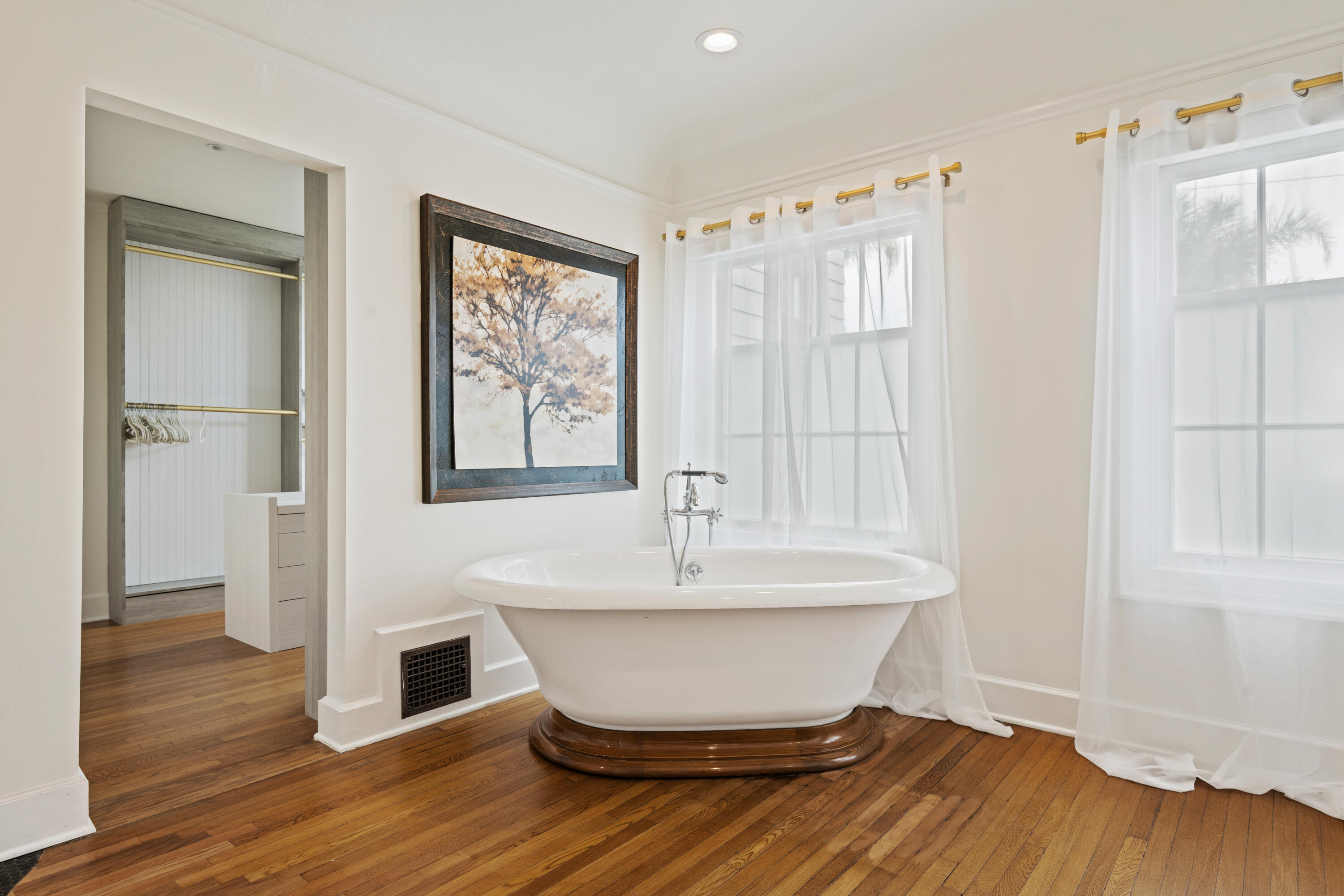 1833 Santa Barbara Street Santa Barbara, CA 93101 - Photo 18 of 34 a view of an empty room with wooden floor and a window