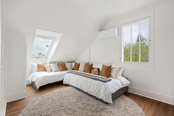 a bed room with a bed and a couch