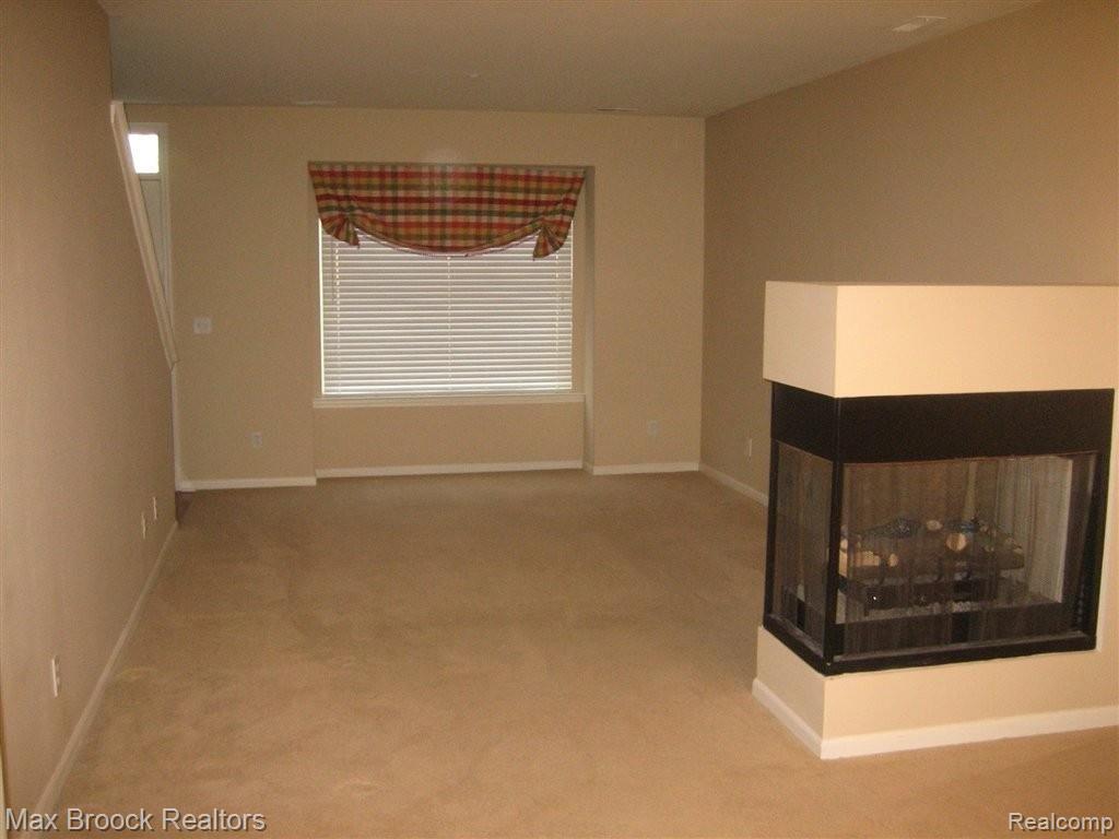 1516 Devon Lane, Unit 12 Troy, MI 48084 - Photo 4 of 6 Family_Room (1).JPG