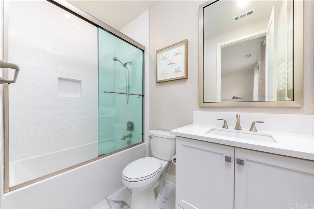 56 Swift Irvine, CA 92618 - Photo 12 of 43 a bathroom with a sink toilet and shower